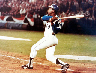 Hank Aaron hits one of the 12 home runs he tallied during the 1973-1/2 season.